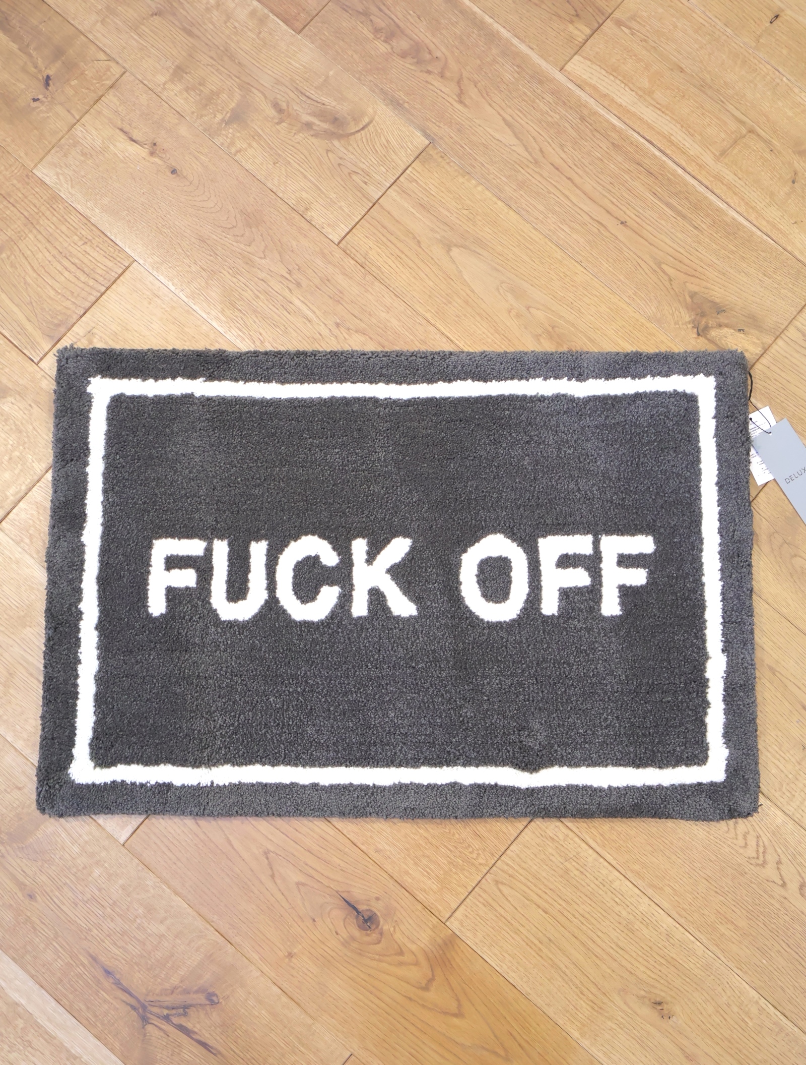DELUXE 　 「FxxK OFF DUDE」　ラグマット