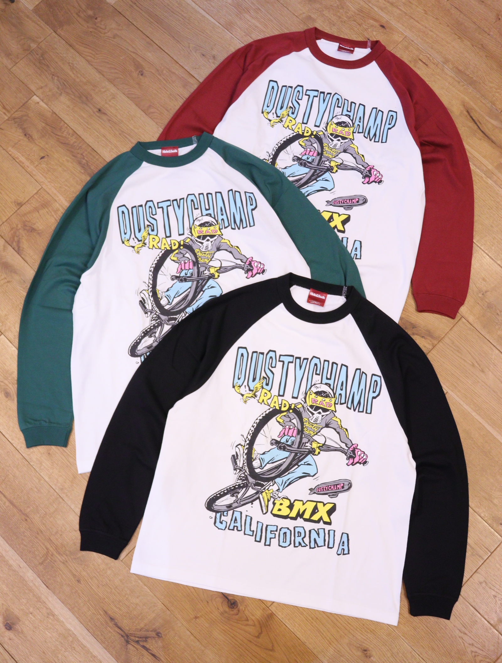 DUSTY CHAMP　「DUSTYCHAMP x Damian Fulton Raglan L/S」　プリントラグランロングスリーブティーシャツ