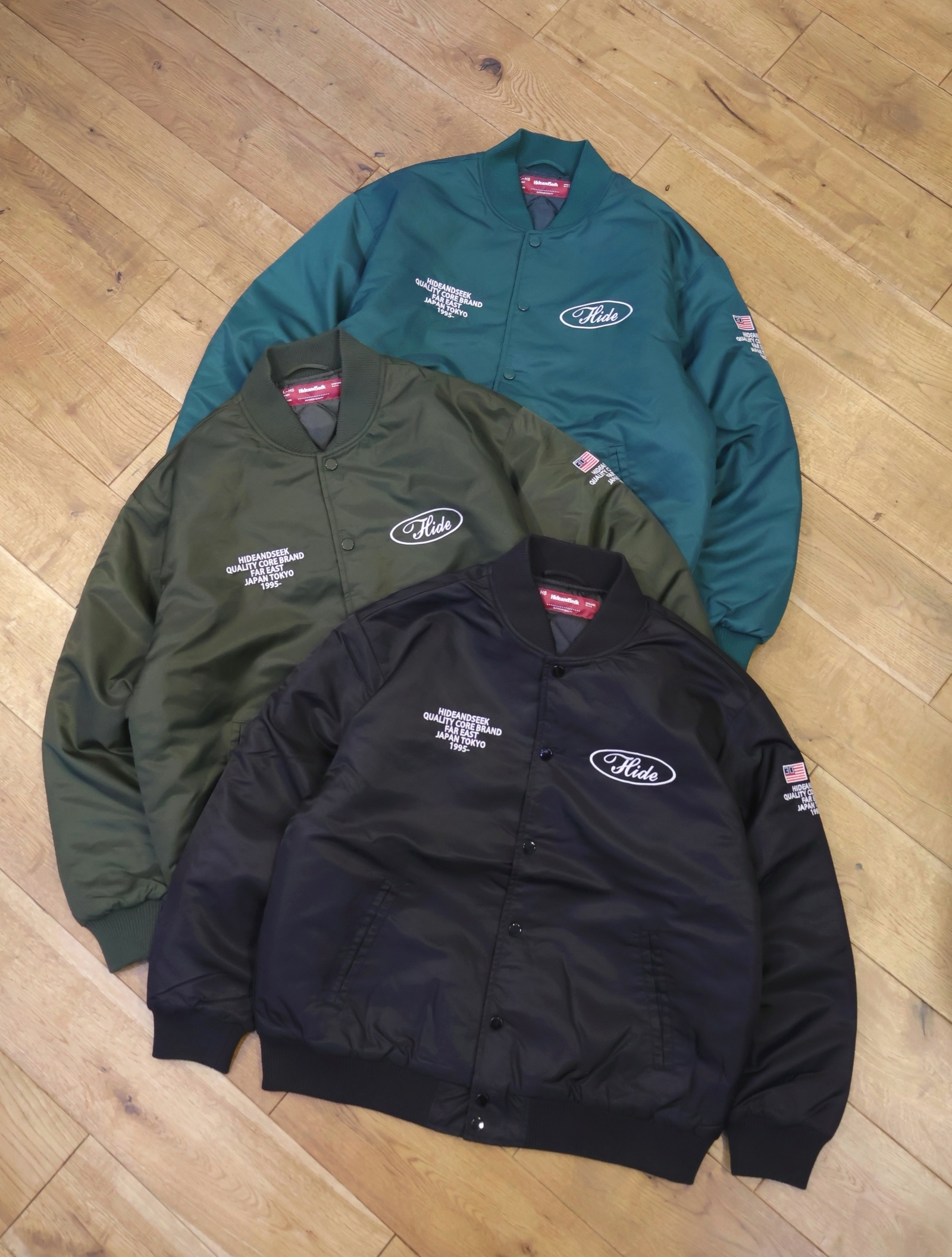 Hide and Seek　「Stadium Jacket(25aw)」　パデッド ナイロンスタジアムジャケット