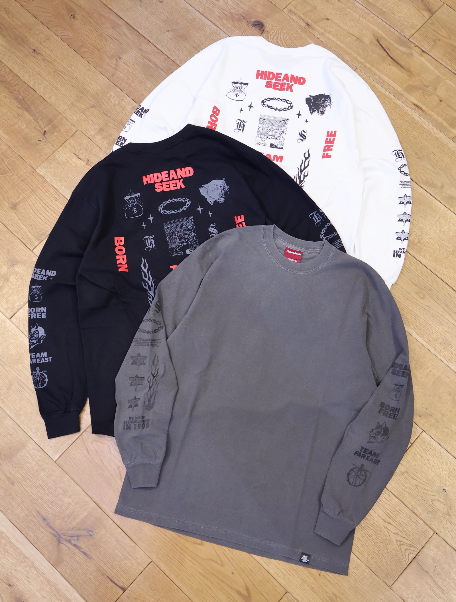 Hide and Seek　「TEAM FAR EAST L/S Tee」　プリントロングスリーブティーシャツ
