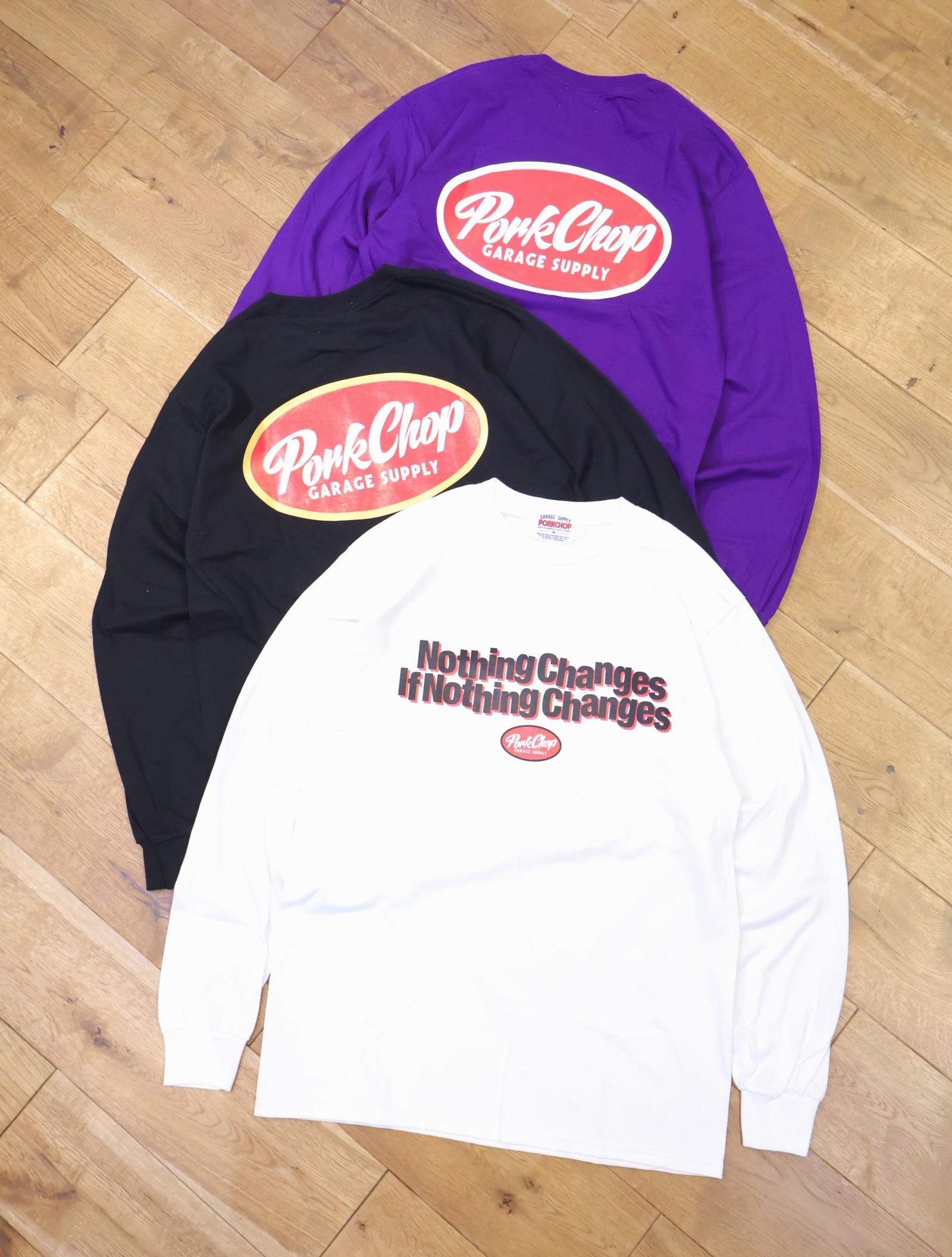 PORKCHOP GARAGE SUPPLY　「NC OVAL SCRIPT L/S TEE」  ロングスリーブプリントティーシャツ