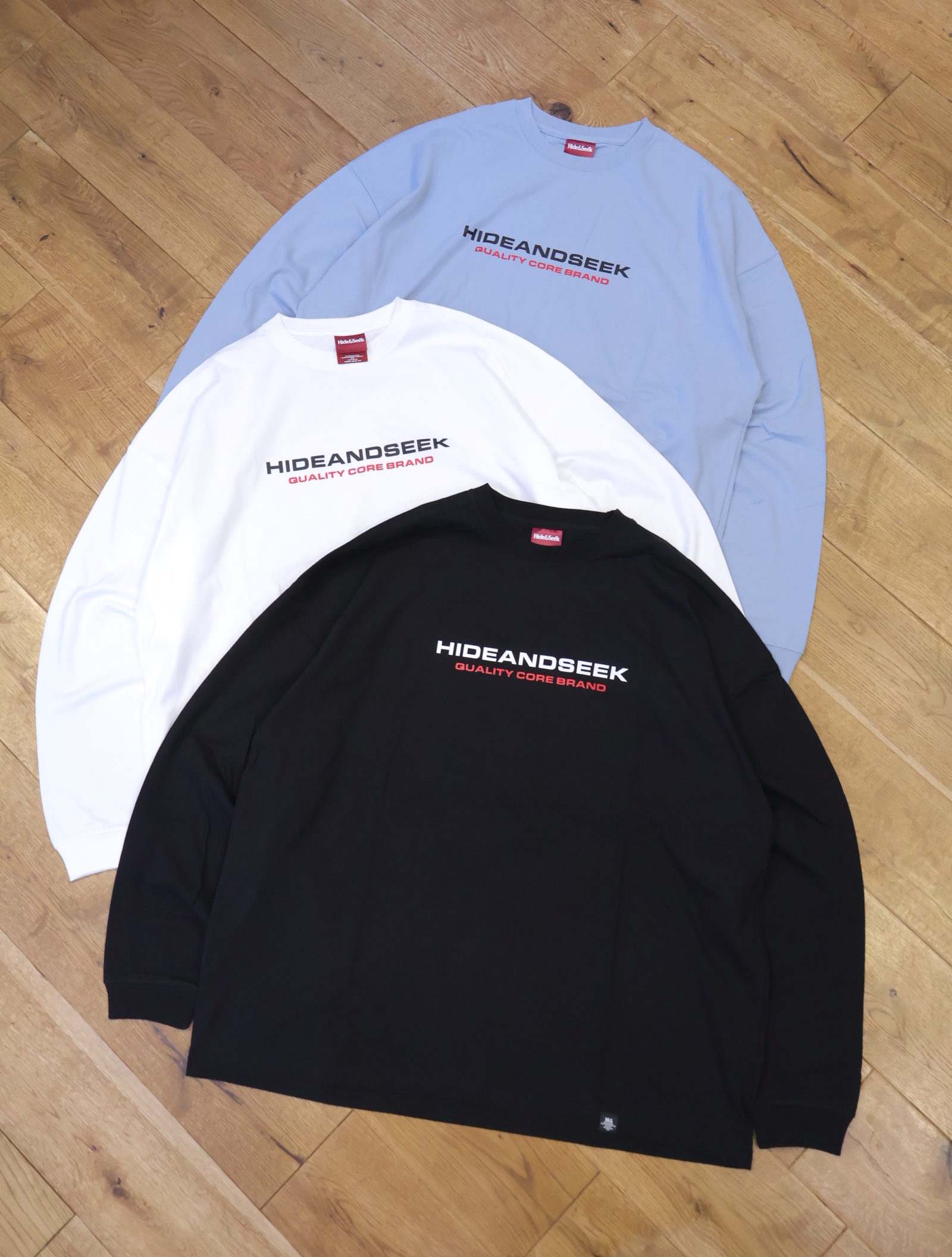 Hide and Seek　「Sports Logo L/S Tee（LOOSE FIT）」　ルーズフィット プリントロングスリーブティーシャツ