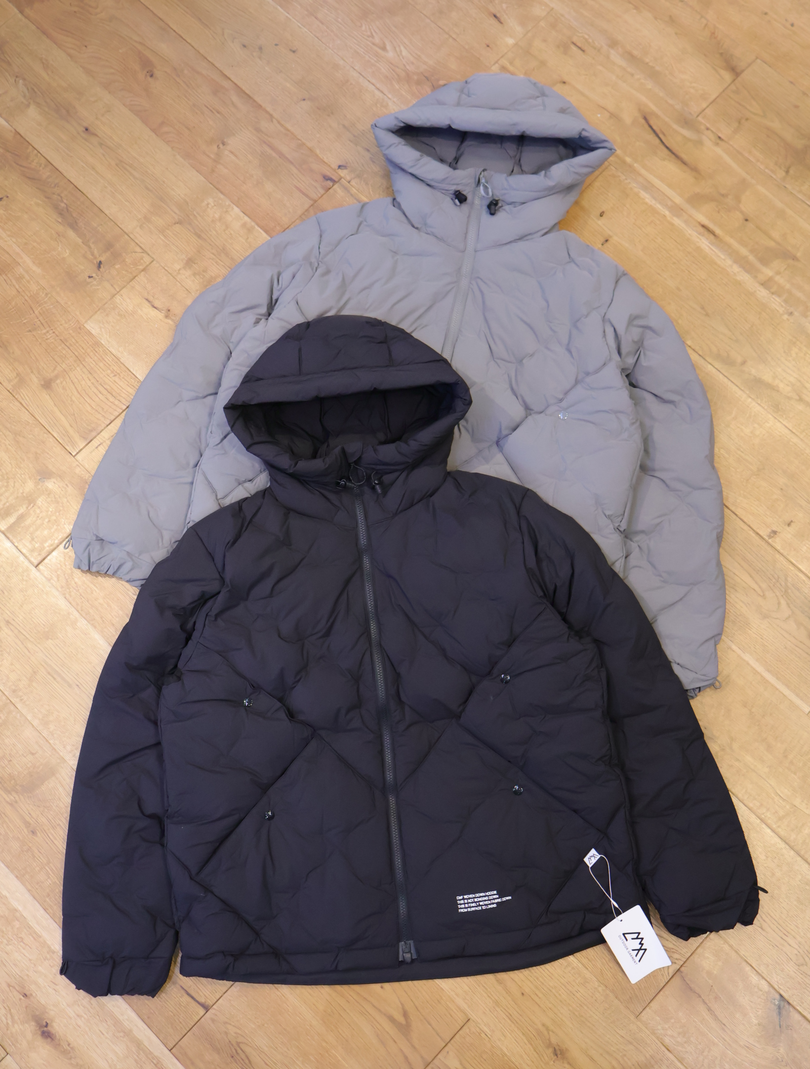 CMF OUTDOOR GARMENT　「CMF WOVEN DOWN HOODIE」　ダウンフーディージャケット