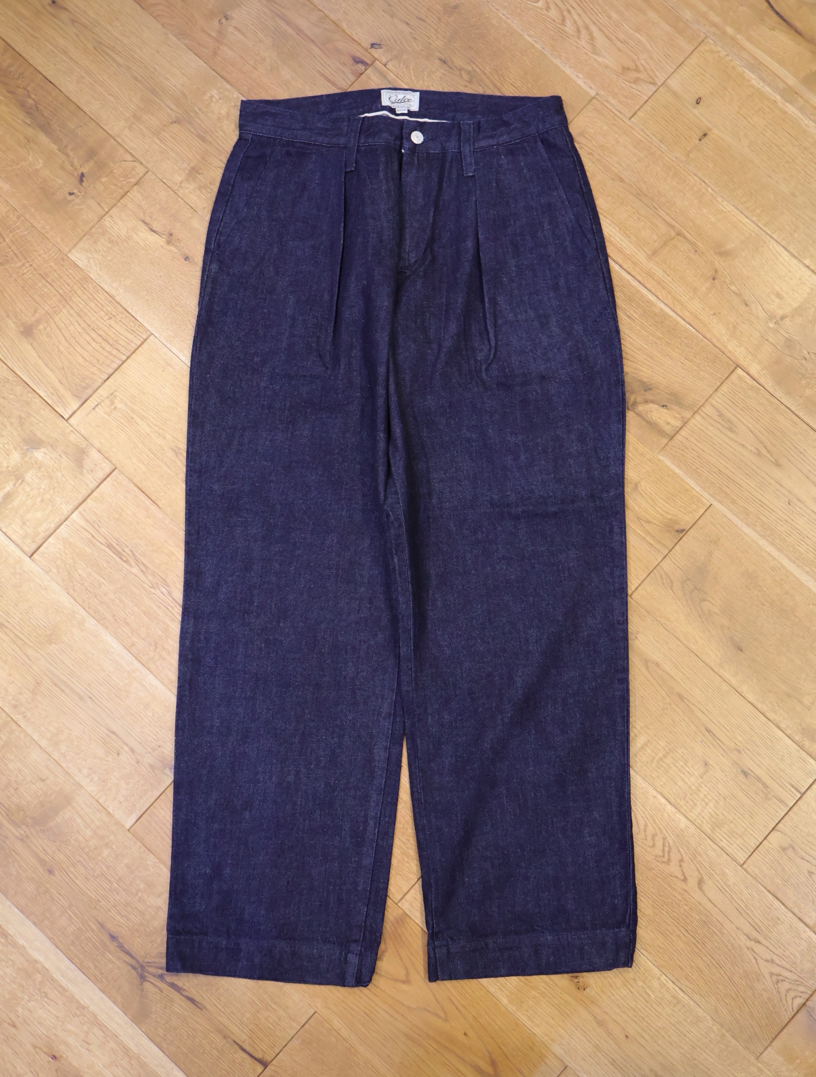CALEE　　「VINTAGE REPRODUCT DENIM TUCK TROUSERS ＜INDIGO＞ 」　デニムトラウザーズ
