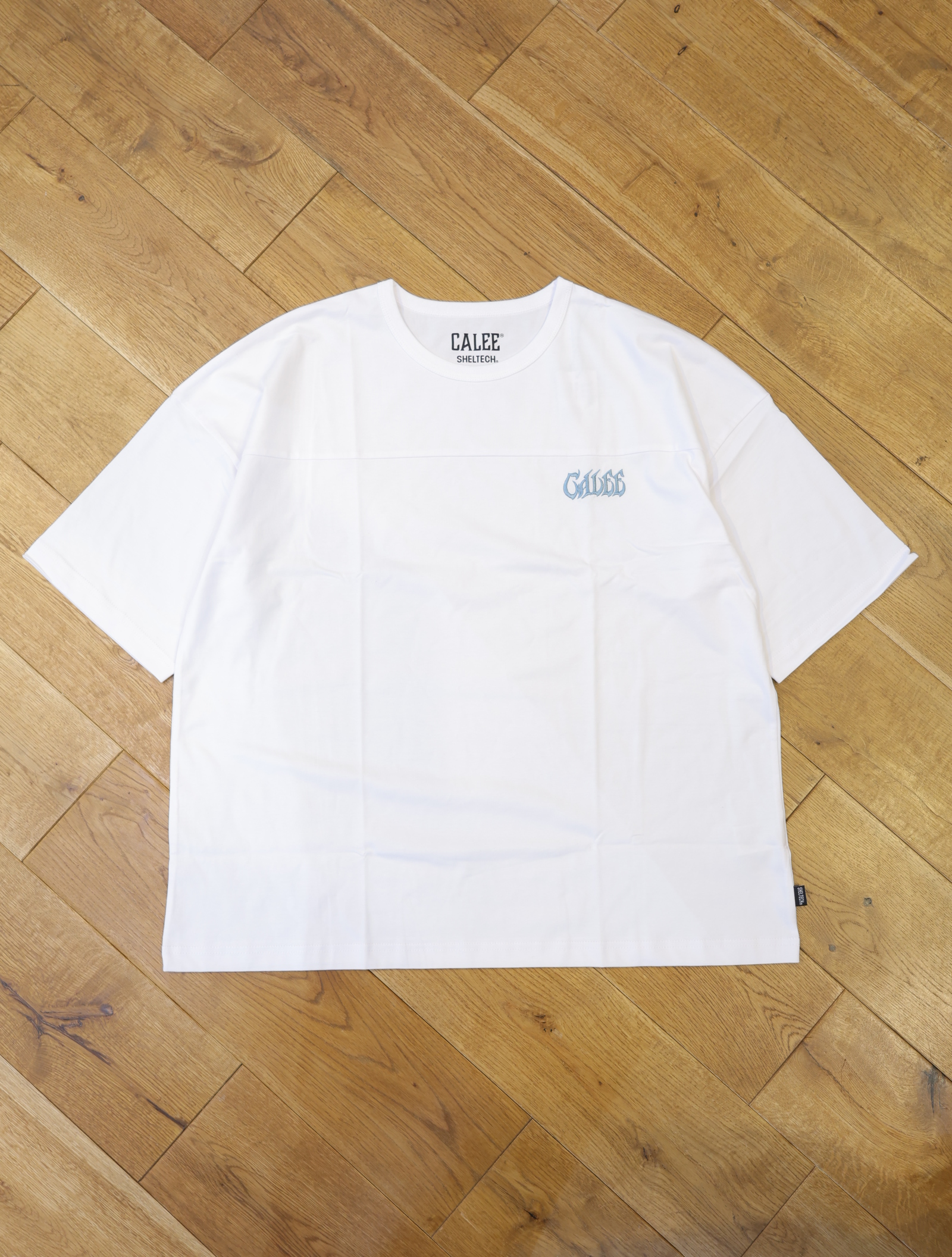 CALEE 「×SHELTECH®︎ LOGO FOOT BALL TEE ＜A TYPE>」 フットボールティーシャツ