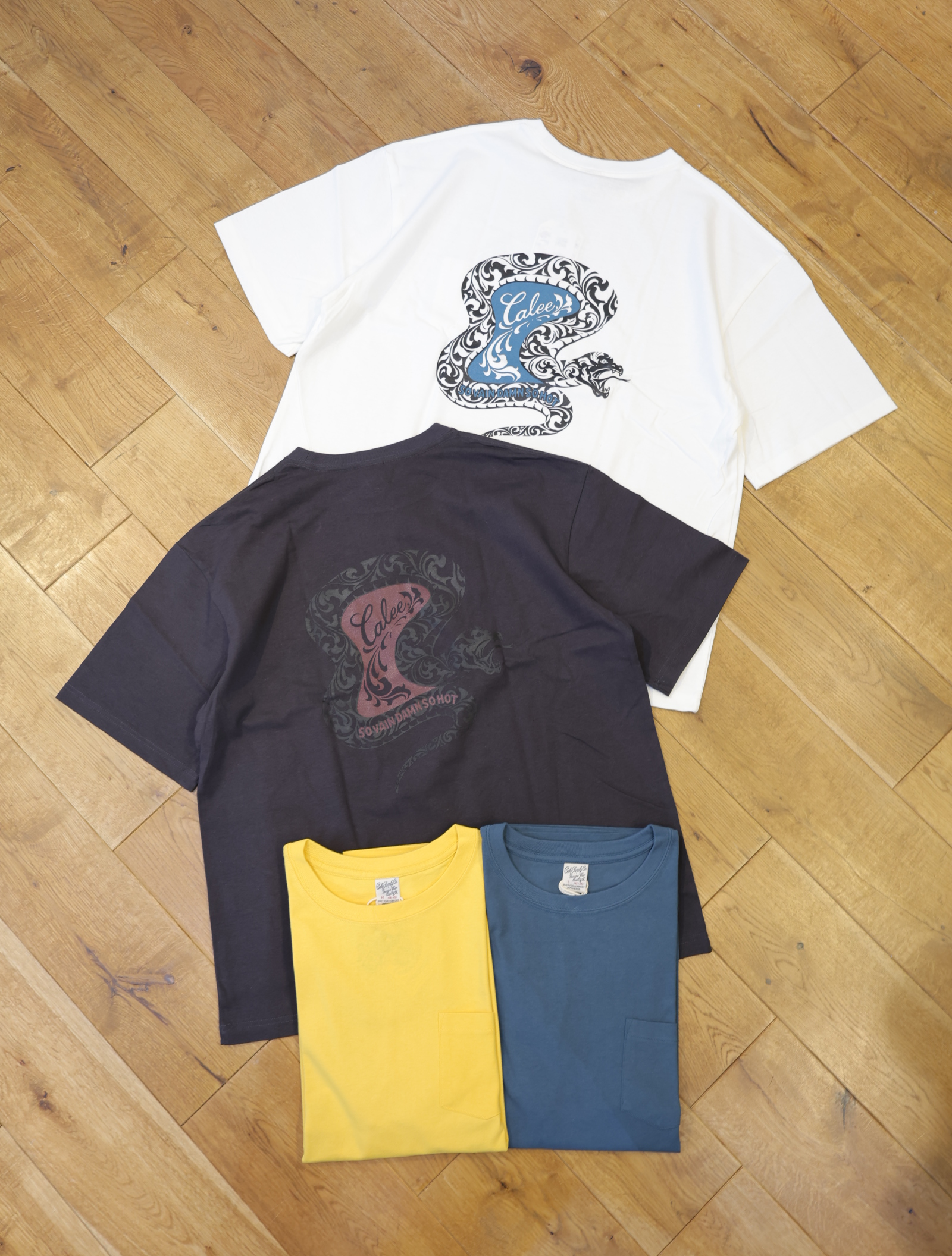 CALEE 「VINTAGE TYPE SNAKE LOGO POCKET TEE ＜NATURALLY PAINT DESIGN＞ 」 ドロップショルダープリントティーシャツ