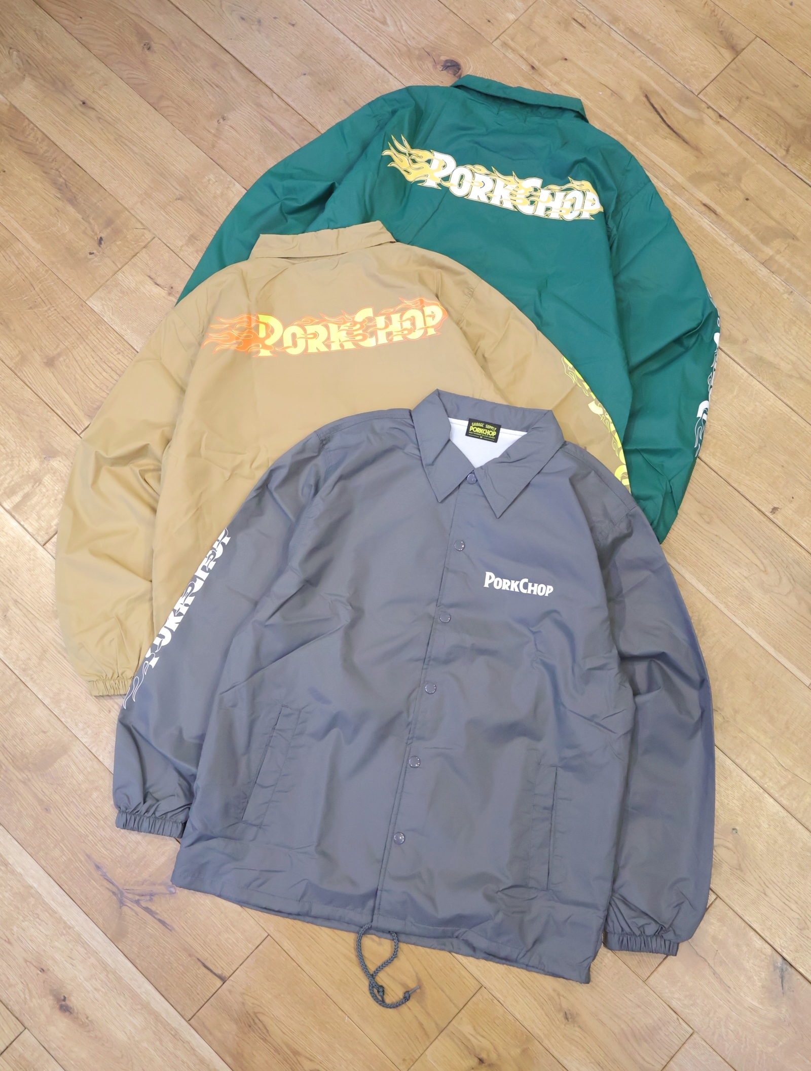 PORKCHOP GARAGE SUPPLY 　「BURNING LOGO COACH JKT」 ナイロンコーチジャケット