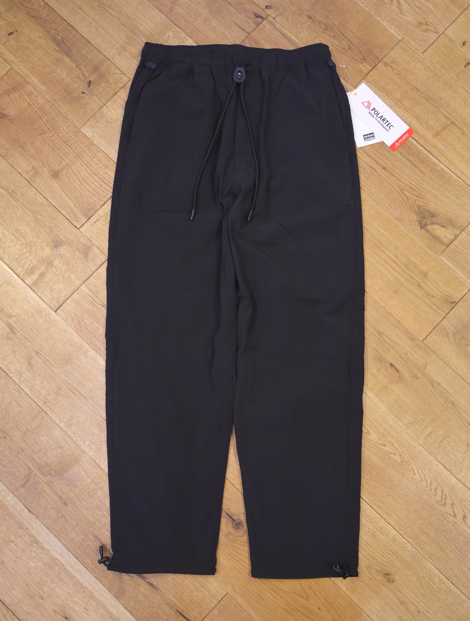 POLIQUANT × WILDTHINGS　「THE ECWCS DEFORMED QUILTING TRACK PANTS / CORDURA® AND POLARTEC®」　トラックパンツ