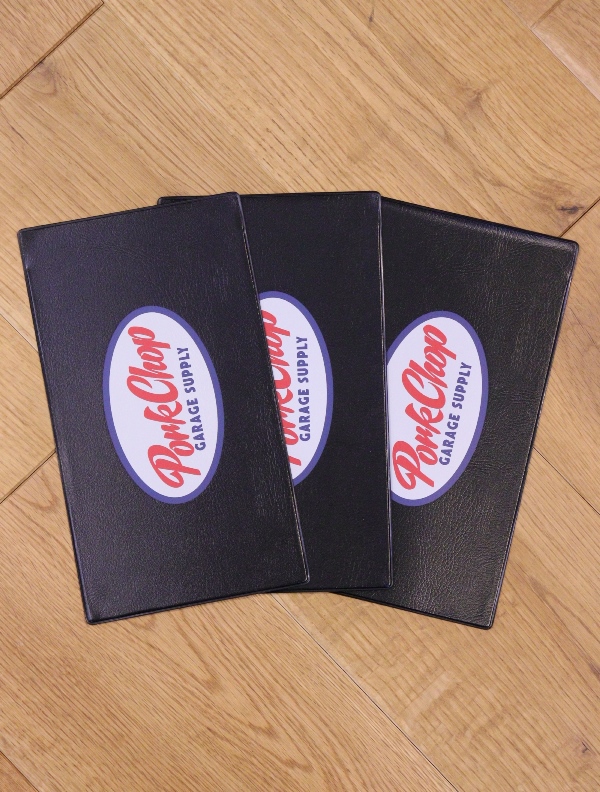 PORKCHOP GARAGE SUPPLY　　「 OWNERS MANUAL CASE 2023 <OVAL> 」 　オーナーズマニュアルケース