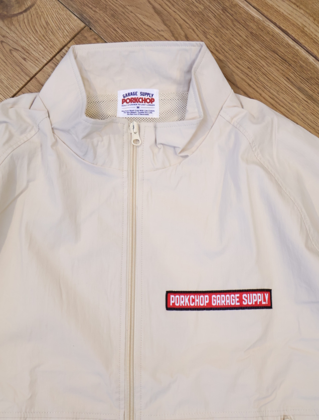 PORKCHOP GARAGE SUPPLY 「BAR & SHIELD TRACK JKT」 ナイロン