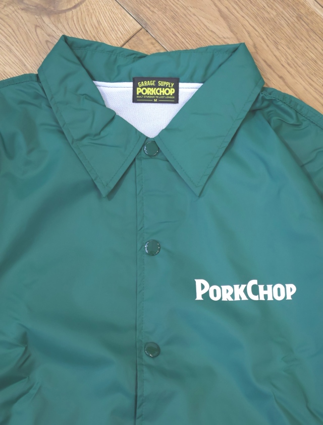 PORKCHOP GARAGE SUPPLY 「BURNING LOGO COACH JKT」 ナイロンコーチ