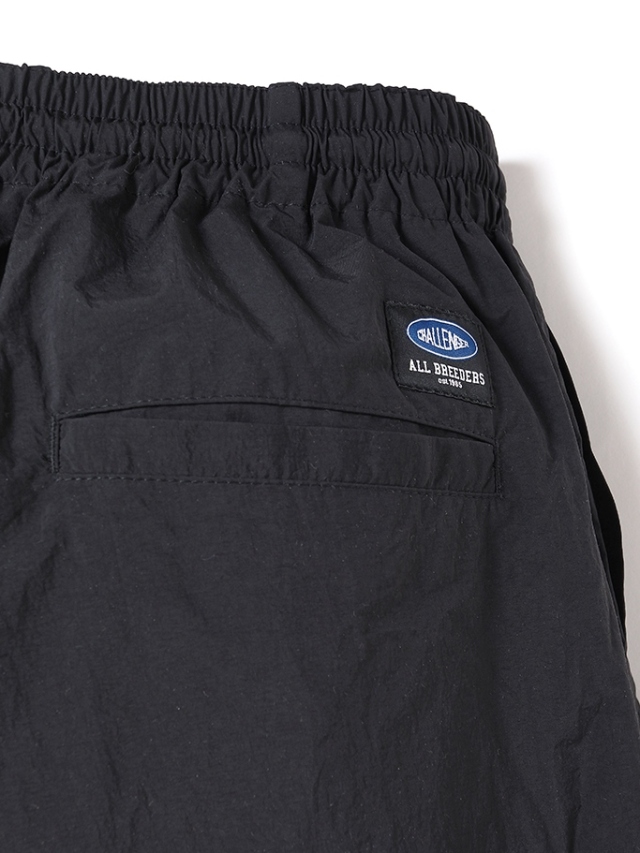 CHALLENGER 「WARM UP PANTS」 ナイロントラックパンツ