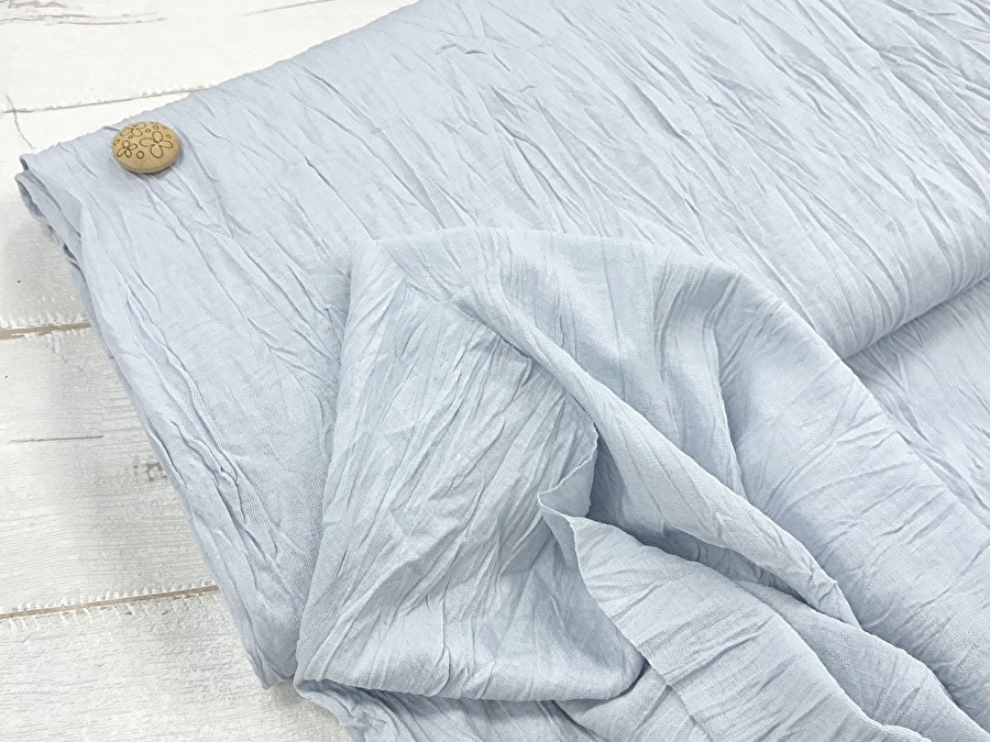 【反売り】やや薄手　シワ加工Ｔ／Ｃ天竺ニット　ライトサックス系 [ 幅１３５ｃｍ×約３.５ｍ ］
