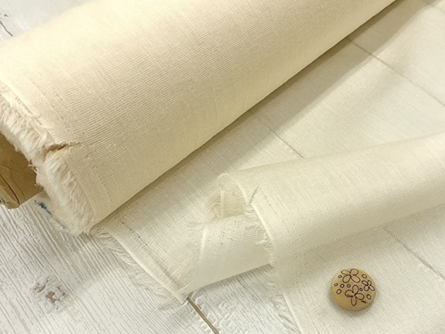 訳あり！【反売り】  [普通地タイプ] ざっくり織物接着芯　アイボリー系 [ 幅１１５ｃｍ×約１５ｍ巻 ]