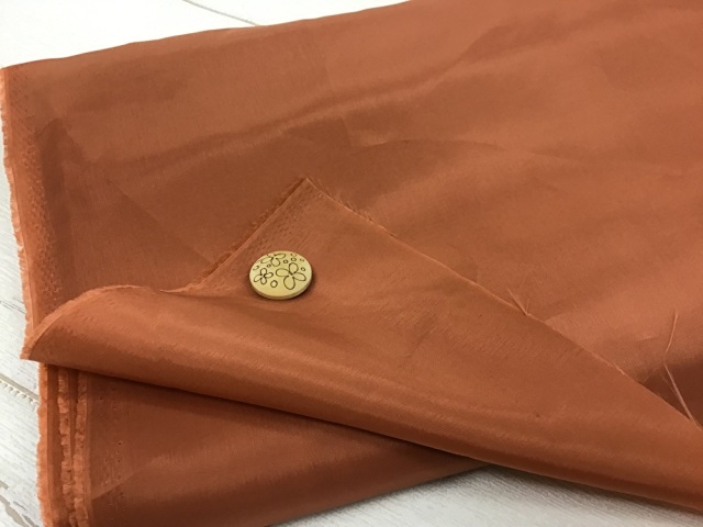 訳あり！【現品処分】  １３５ｃｍ幅　キュプラ裏地　オレンジ系[ メーター選択制 ]