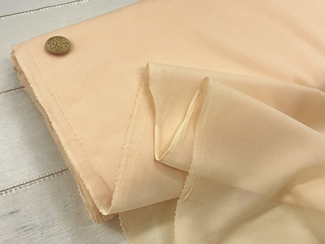 【反売り】  [やや薄手タイプ] ニット用織物接着芯　 ピーチオレンジ系 [ 幅１１０ｃｍ×約７.５ｍ巻 ]