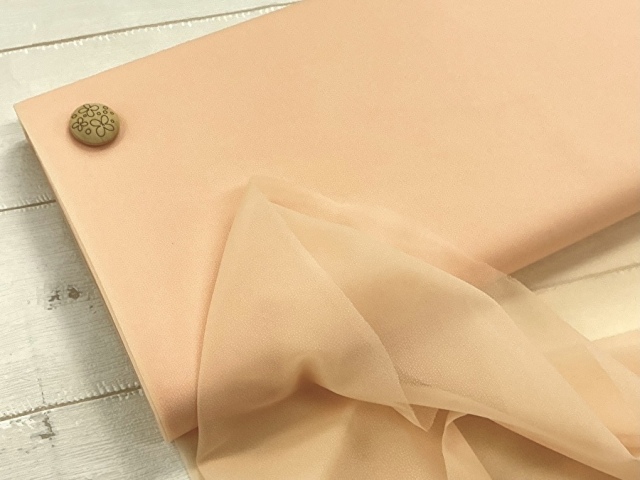 【反売り】  [薄手タイプ] ニット用織物接着芯　 ピーチオレンジ系 [ 幅１１０ｃｍ×約６m巻 ]
