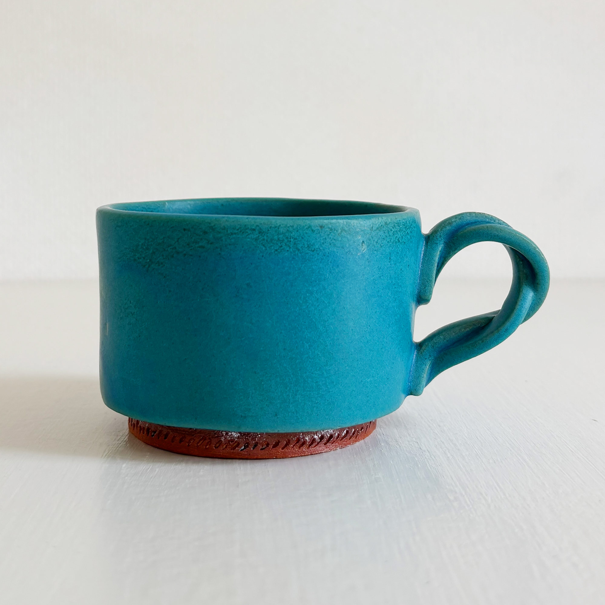 nacchico（ナッチーコ）ねじねじ持ち手のコーヒーカップ（ターコイズ）