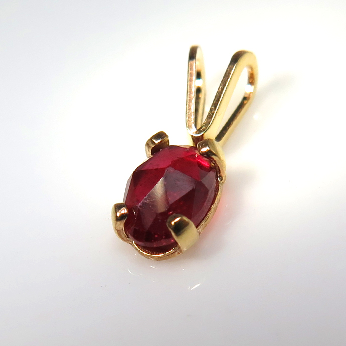 14kgfペンダントトップ 天然石ルビー（鉛ガラス充填） ローズカットオーバル6×4mm「ゴールドフィルド」（25個）