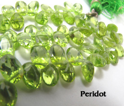 天然石ビーズ・ペリドット/オーバルカット（1/4連）