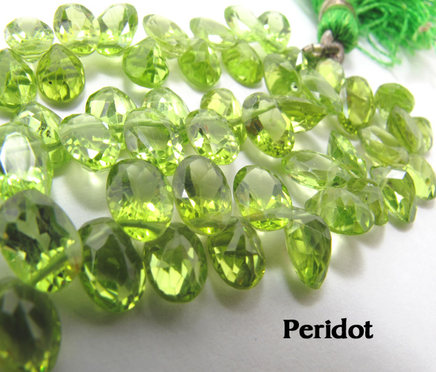 天然石ビーズ・ペリドット/オーバルカット（1/4連）
