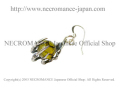 【ネクロマンス NECROMANCE】 イエロードラゴンアゲート ボーンハンドピアス Yellow Dragon Agate Bone Hand Pierce 黄龍紋瑪瑙 骸骨