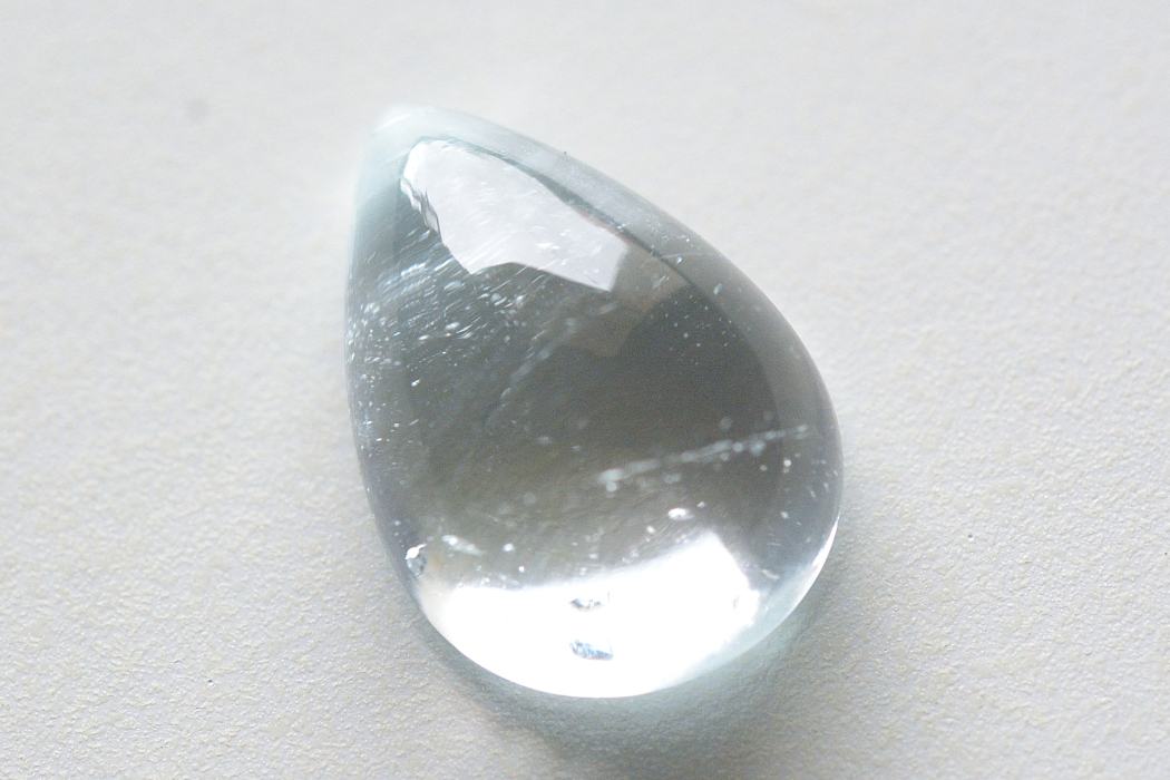 ブルートパーズ【64】天然石ルース・カボション・ローズカット（17.5×12mm）
