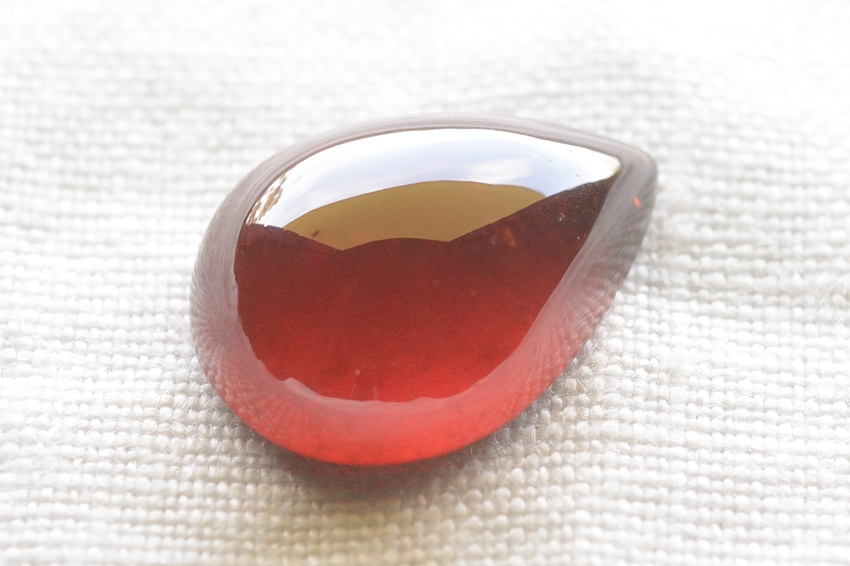 ヘソナイト（オレンジガーネット）【20】　天然石ルース・カボション（20×14.5mm）