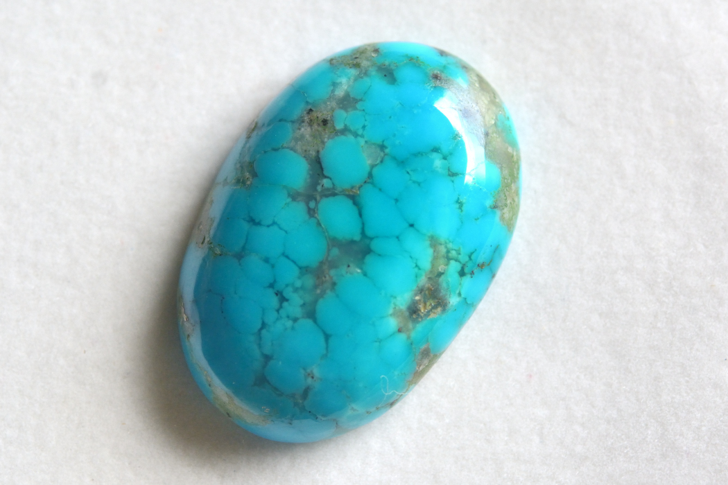 スリーピングビューティーターコイズ（珪化ターコイズ）【9】ルース・カボション（23×16mm）