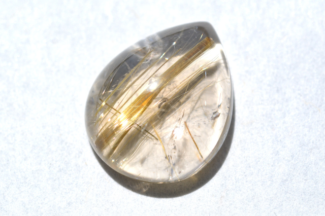 ゴールドタイチンルチルクォーツ【56】ルース・カボション（22×17.5mm）