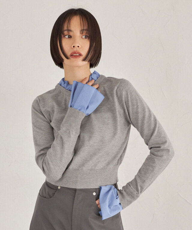 ドッキングフリルネックニット