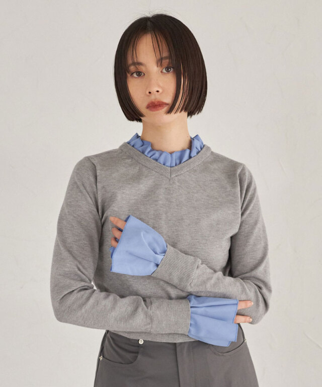 ドッキングフリルネックニット