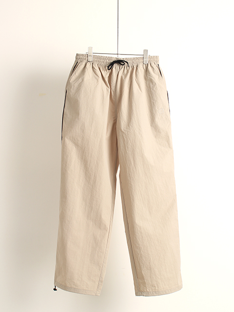 コンニチワボンジュール23ナイロンウォームアップパンツベージュ