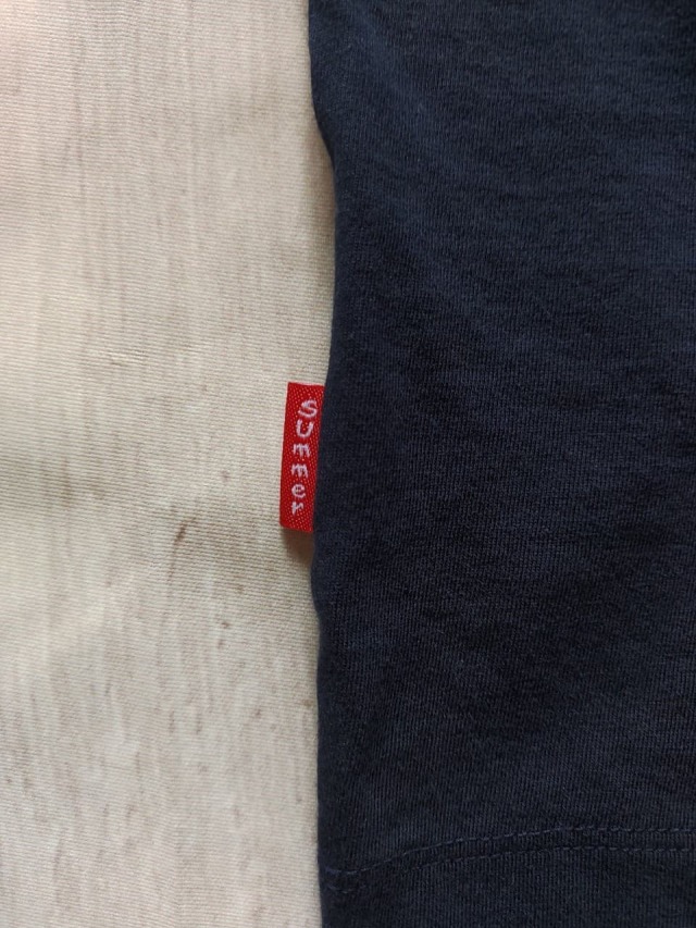 USED古着(ユーズドフルギ) TARZANKICK クルーネックTシャツの