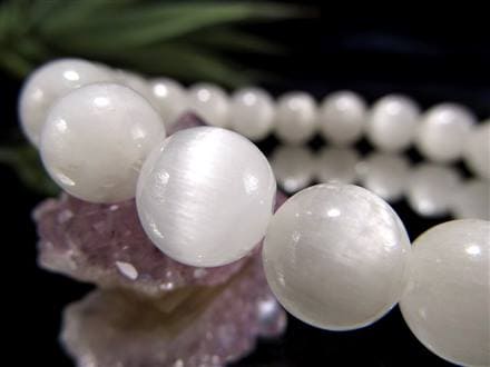 ◇5Aランクの厳選品◇輝き放つキャッツアイ効果◇針の向きが揃った純白  