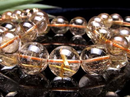☆スモーキーな水晶に輝く金針☆煙る色合いに走る繊細針☆金運・勝負運