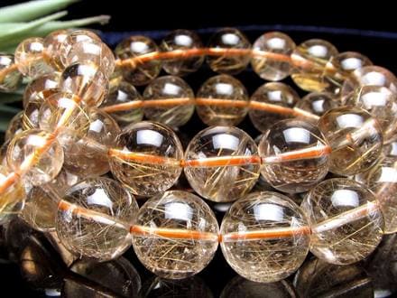 ☆スモーキーな水晶に輝く金針☆煙る色合いに走る繊細針☆金運・勝負運