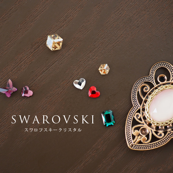 スワロフスキー小さな一粒ハートの貼るピアス