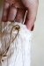 CHIGNON（シニヨン）巾着ポーチ　0636-550BZ-IVORY