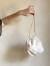 CHIGNON（シニヨン）巾着ポーチ　0636-550BZ-IVORY