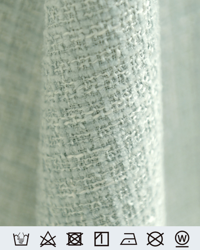 ミントグリーンのツイード生地、軽やかで清楚な印象を与えます。