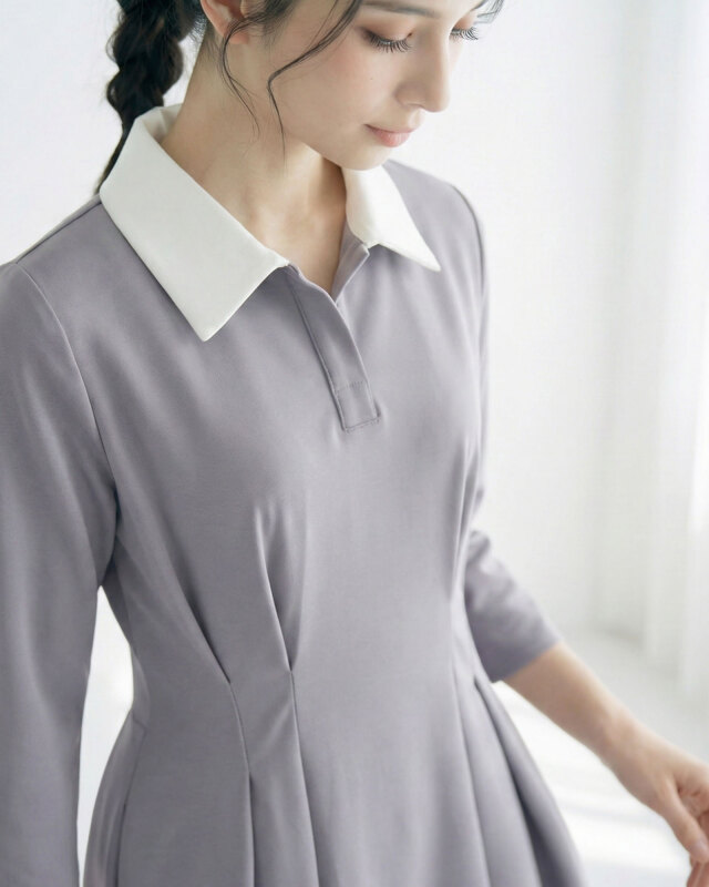 清楚な白襟ワンピースを軽やかに着こなす女性の上品コーデ