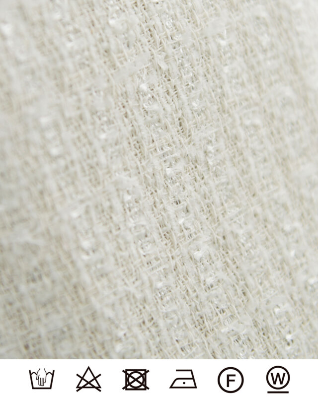 上品なツイード素材の風合いが魅力のショートジャケット生地アップ。レジーナ【神戸ワンピース専門店】