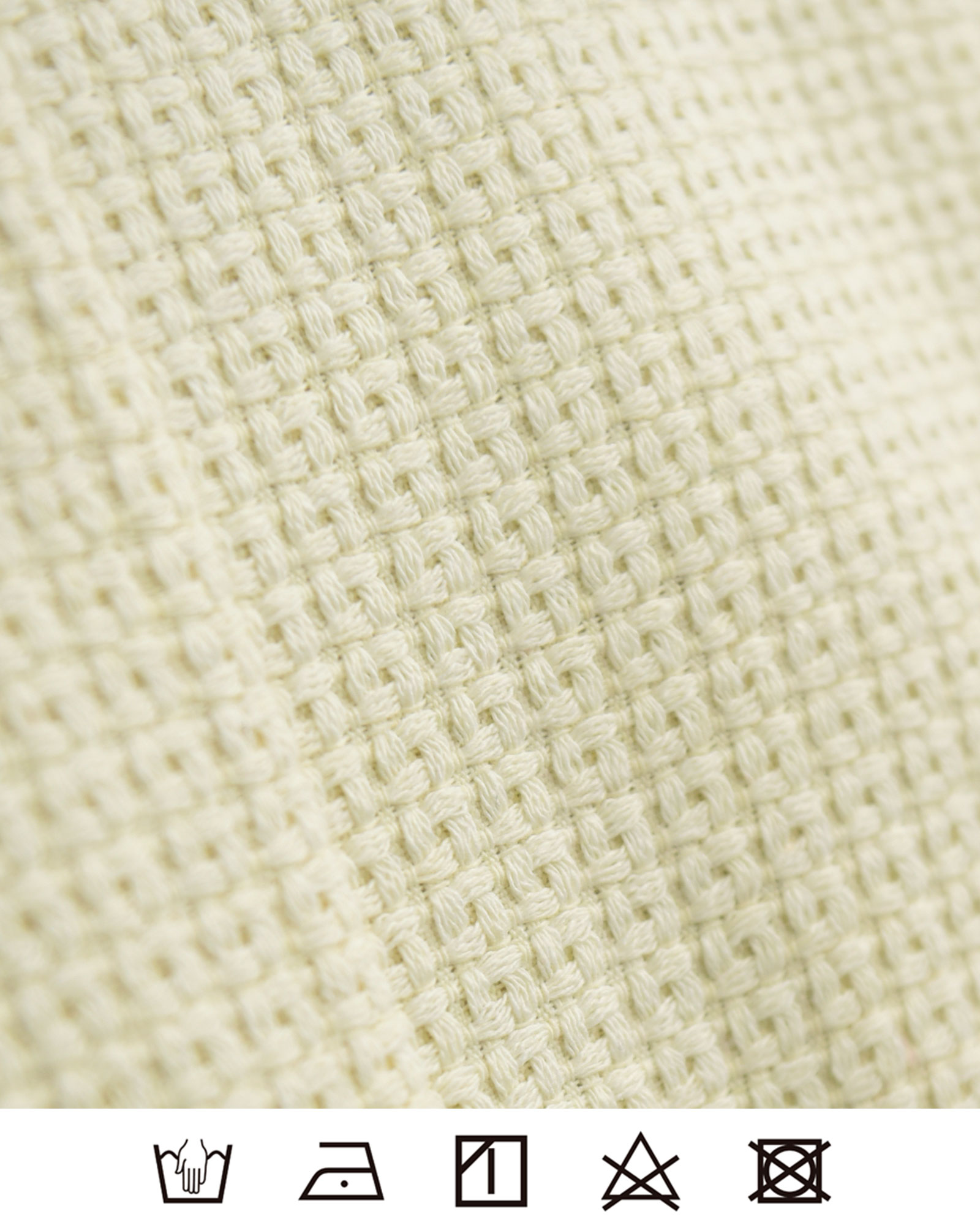 上品なツイード素材の風合いが魅力のショートジャケット生地アップ。レジーナ【神戸ワンピース専門店】