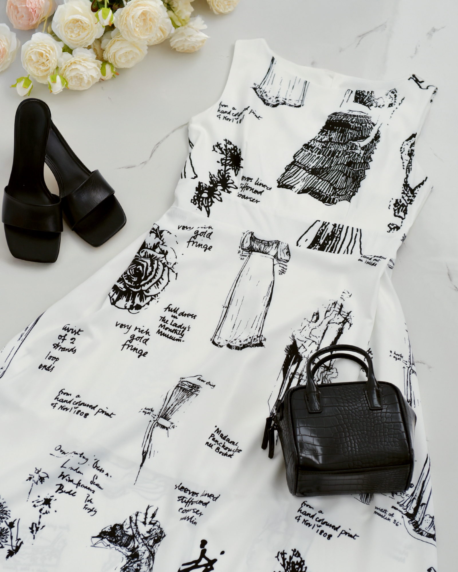 ヴィンテージ感あるアート柄が魅力のノースリーブワンピース。レジーナ【神戸ワンピース専門店】