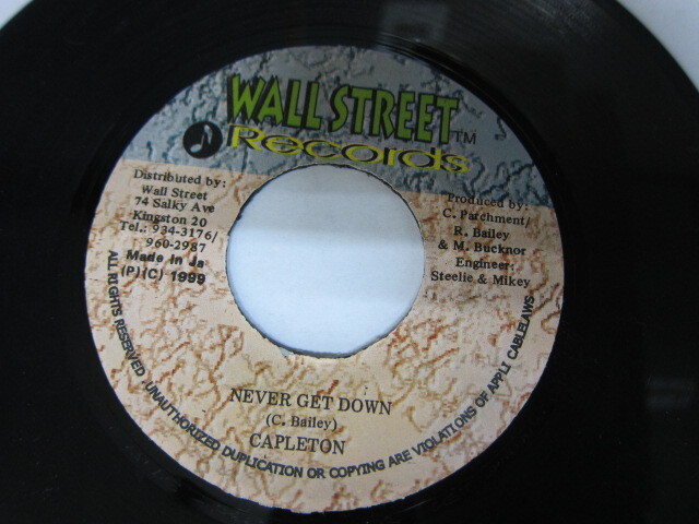 CAPLETON / NEVER GET DOWN / WALL STREET