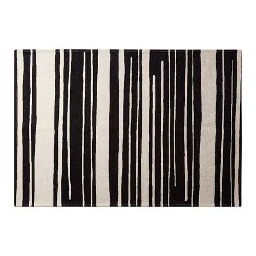 WH/BKカラーで無作為に描かれた　ストライプラインのデザインを落とし込んだラグ。