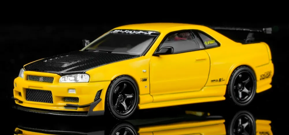 [予約] モーターヘリックス 1/64 ニッサン スカイラインGT-R (R34) カスタム ライトニングイエロー GTエアロキット装着車　M63475