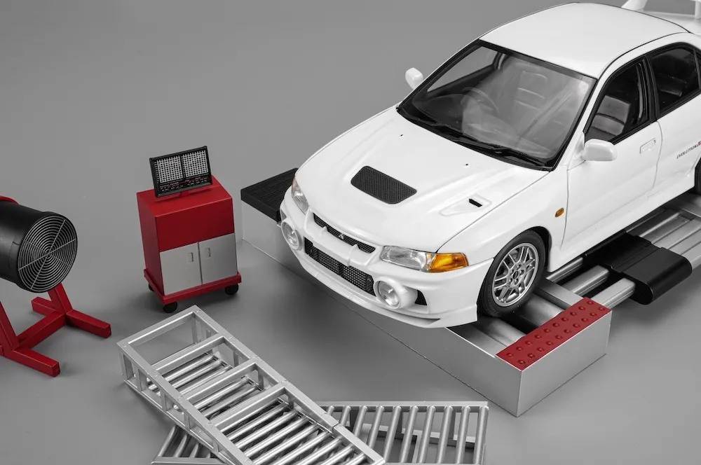[予約] モーターヘリックス 1/18 ミツビシ ランサーエボリューション4 GSR スコシアホワイト ダイナモ付　M84013