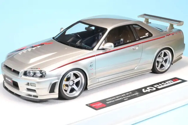 アイドロン 1/18 ニッサン スカイライン GT-R (BNR34 NISMO R-tune Version) 2004 シルバー/ニスモストライプ　EML135A